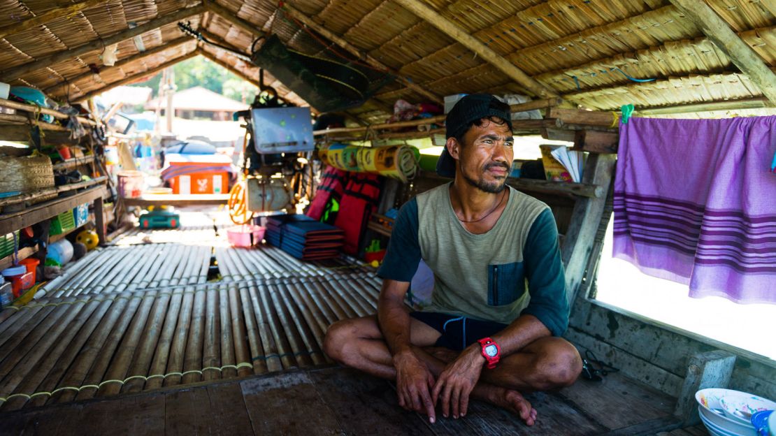Hook Klathalay on the deck of his houseboat.