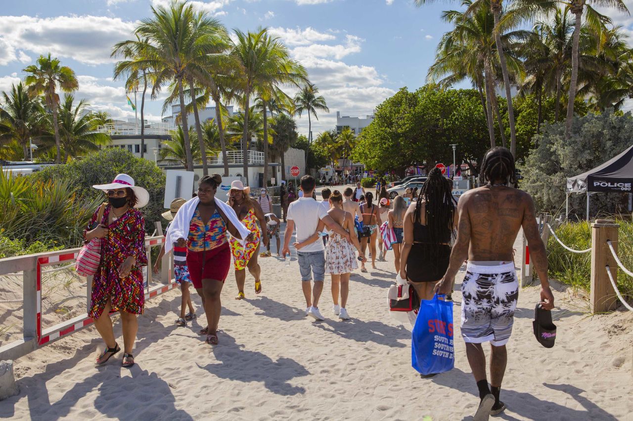 Beachgoers are seen in Miami on March 22.<a href="https://www.cnn.com/2021/03/22/us/miami-beach-state-of-emergency/index.html" target="_blank"> Miami Beach was forced to extend a curfew and state of emergency,</a> possibly for several weeks, after city police struggled to control shoulder-to-shoulder crowds of spring breakers over the weekend, Mayor Dan Gelber said.