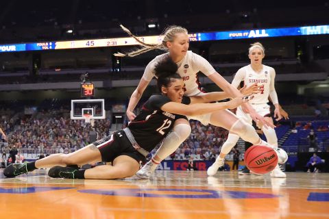 South Carolina's Brea Beal and Stanford's Cameron Brink chase down a loose ball.