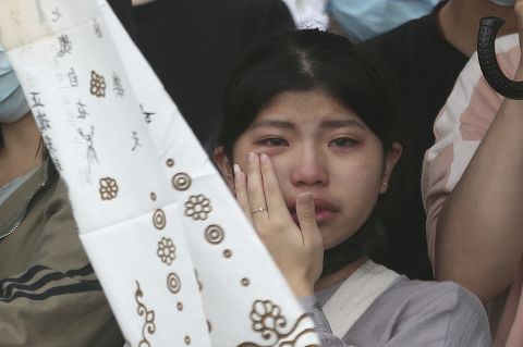 A woman cries on Saturday as families of the victims mourn near the Taroko Gorge.