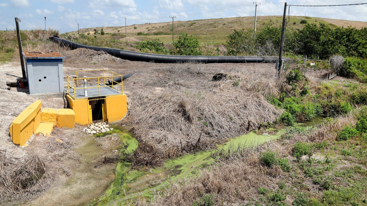 March 30, 2021, PALMETTO, Florida, USA: A view of a phosphogypsum stack, far, background, and water management at HRK Holdingsâ€™ property off Buckeye Road on Tuesday, March 30, 2021, in Palmetto, Manatee County, where wastewater is suspected to be leaking at the old Piney Point phosphate plant in Palmetto, records show. Florida environmental officials are allowing HRK Holdings to discharge some of the water at Port Manatee on Tampa Bay to prevent â€œa potential catastrophic failure.â€ The emergency order from the Department of Environmental Protection comes after HRK Holdings reported last Thursday that it had found a leak at the site, a state spokeswoman said. (Credit Image: © Douglas R. Clifford/Tampa Bay Times via ZUMA Wire)