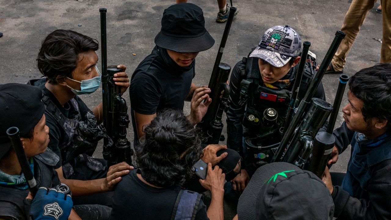 Anti-coup protesters hold improvised weapons during a protest in Yangon on April 3, in Yangon, Myanmar. 