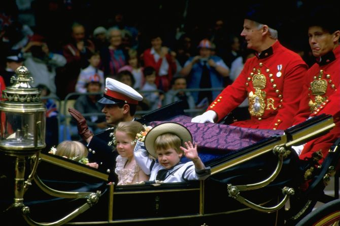 Prince William waves from a carriage en route to the wedding of his uncle Prince Andrew and Sarah Ferguson in 1986.
