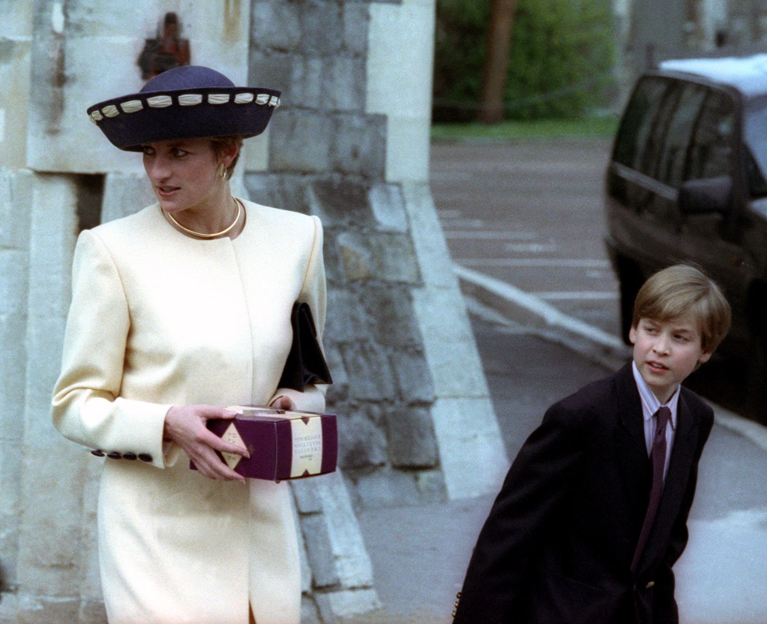 Princess Diana and Prince William wait for Prince Harry after attending an Easter Sunday church service at Windsor Castle in 1992.