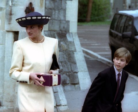Princess Diana and Prince William wait for Prince Harry after attending the annual Easter Sunday church service in 1992 at St. Georges Chapel inside Windsor Castle.