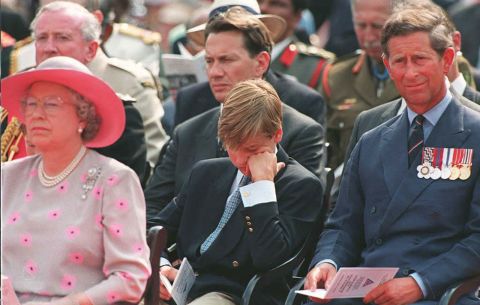 Queen Elizabeth II, Prince William and Prince Charles attend a service commemorating VJ Day outside Buckingham Palace in August 1995. The event was in honor of the day Japan surrendered to Allied forces, effectively ending World War II.