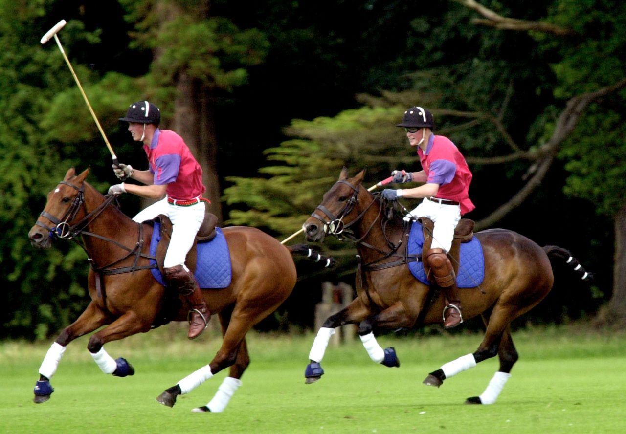 William, left, and Harry take part in an exhibition polo match in Gloucestershire, England, in 2001.