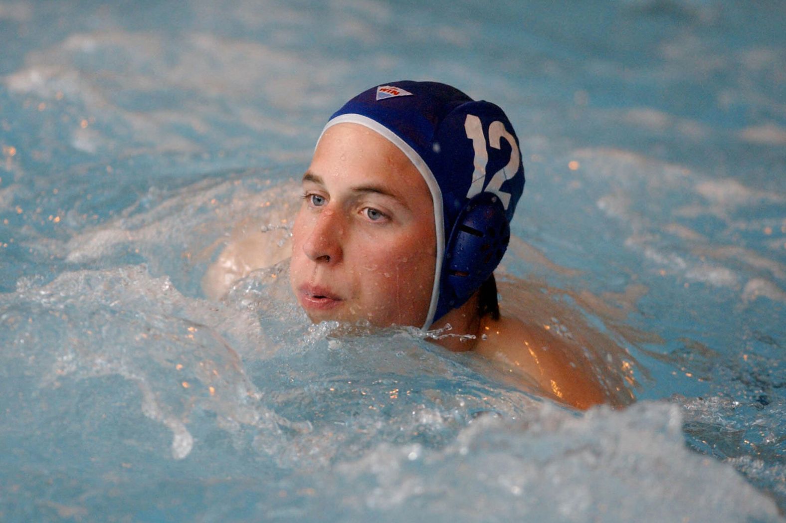 Prince William makes his water polo debut for the Scottish national universities squad during the annual Celtic Nations tournament in April 2004. William was attending the University of St. Andrews.