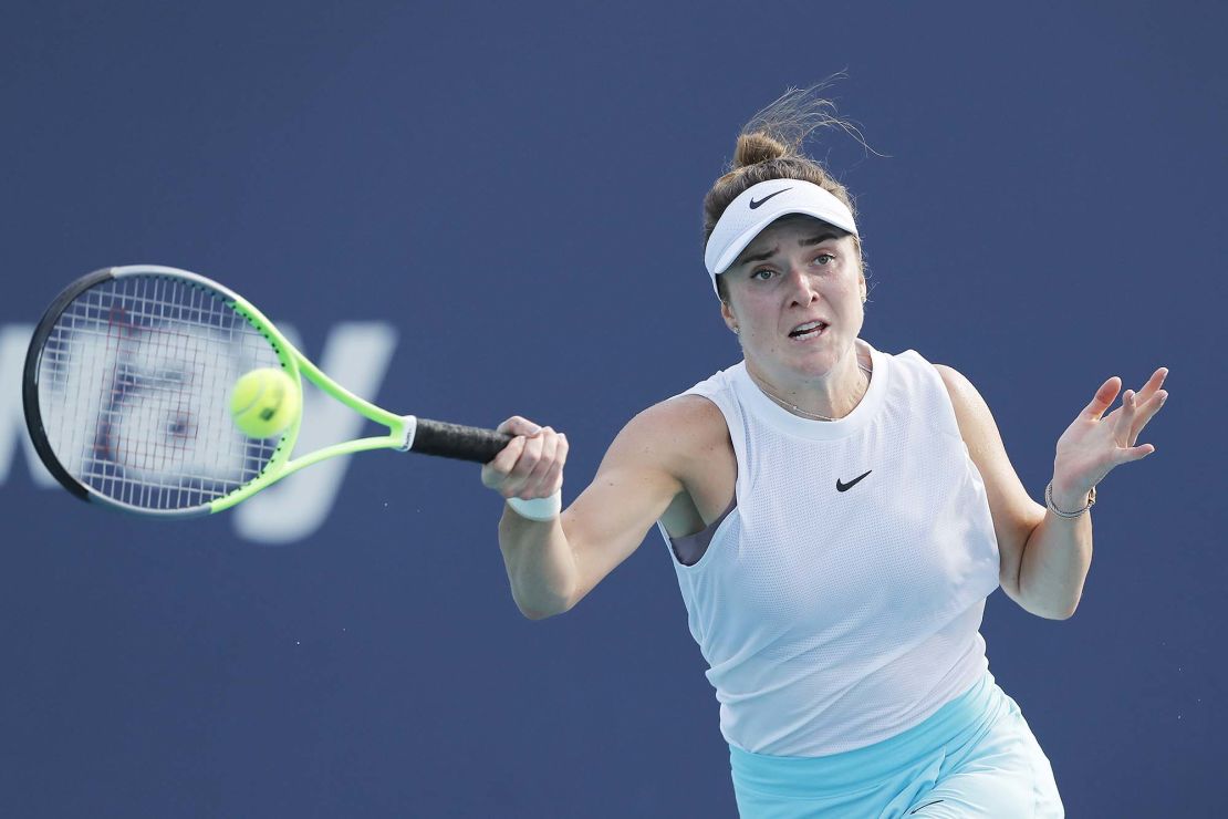 Elina Svitolina of Ukraine returns a shot to Ashleigh Barty of Australia in their semifinal match during the Miami Open at Hard Rock Stadium on April 01, 2021 in Miami Gardens, Florida.