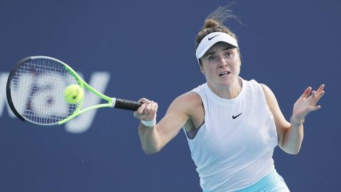 Elina Svitolina of Ukraine returns a shot to Ashleigh Barty of Australia in their semifinal match during the Miami Open at Hard Rock Stadium on April 01, 2021 in Miami Gardens, Florida.