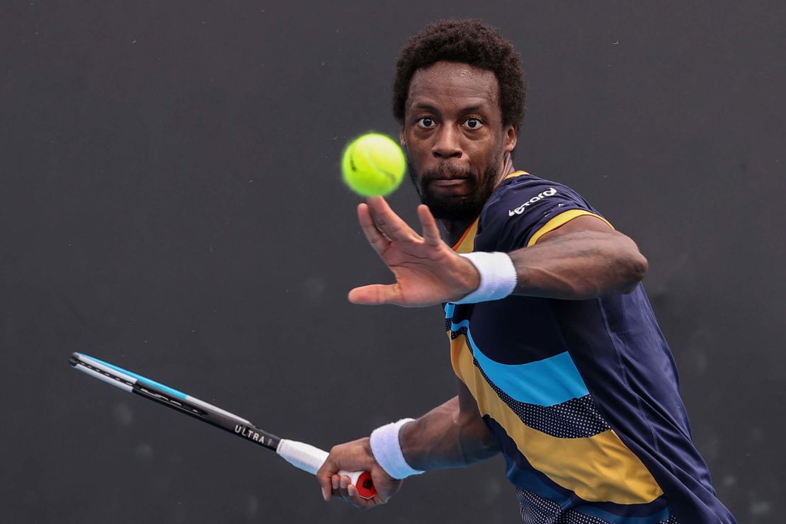 France's Gael Monfils hits a return against Finland's Emil Ruusuvuori during their men's singles match on day one of the Australian Open tennis tournament in Melbourne on February 8, 2021.