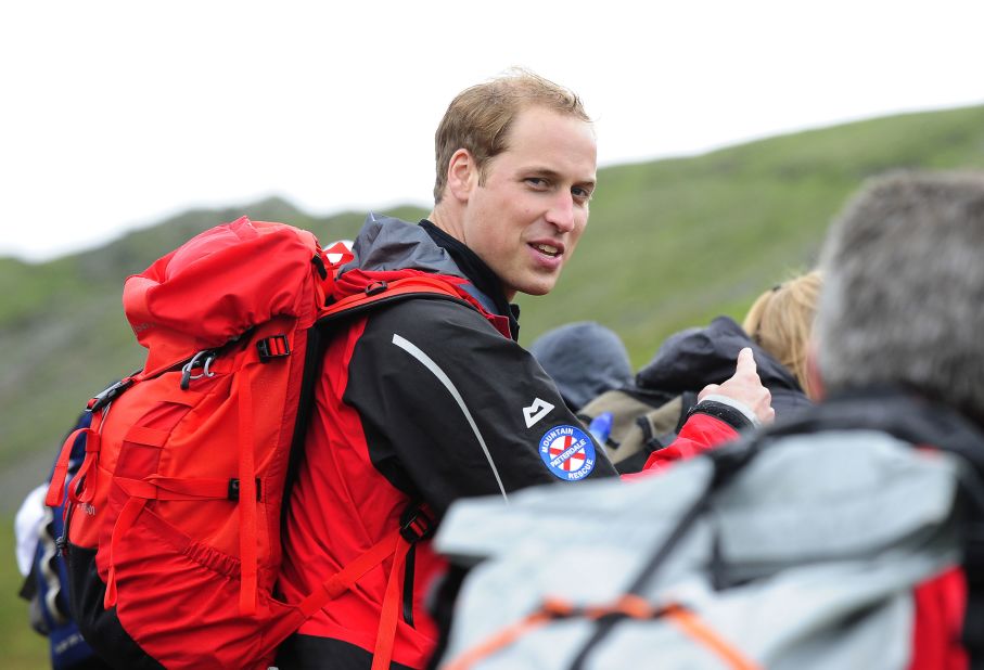 Prince William walks with a group of homeless people during a 2009 hike with Centrepoint, the United Kingdom's largest youth charity for the homeless. William became the patron of the organization in 2005.