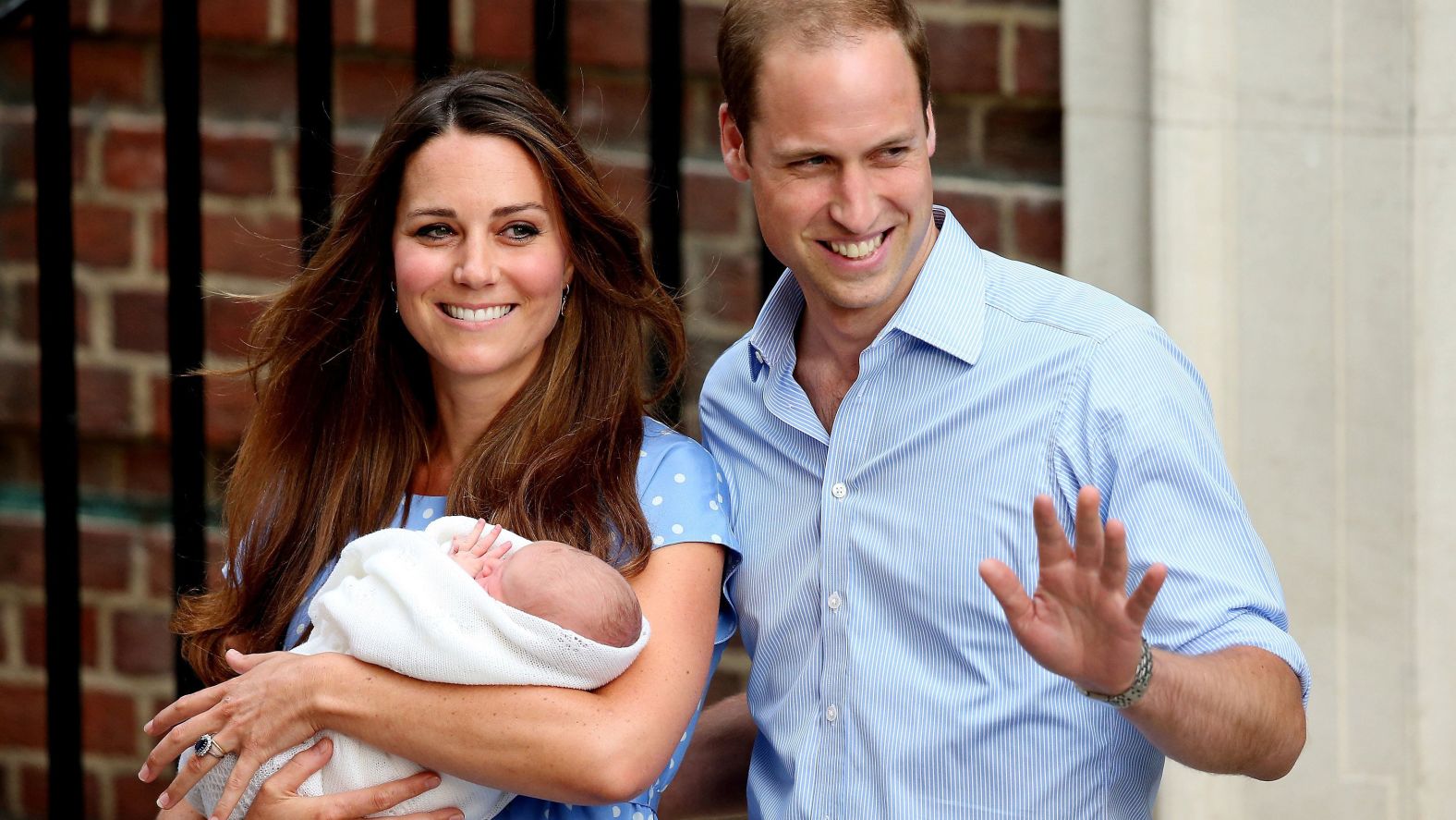 William and Catherine depart St. Mary's Hospital in London with their newborn son, George, in July 2013.