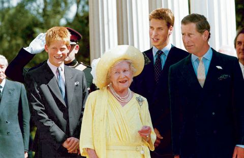 Britain's Queen Mother joins Prince Charles and his sons during an occasion marking her 99th birthday at her London residence in 1999.