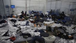 Young children rest inside a pod at the Donna Department of Homeland Security holding facility, the main detention center for unaccompanied children in the Rio Grande Valley run by the Customs and Border Patrol (CBP), in Donna, Texas on March 30, 2021. 