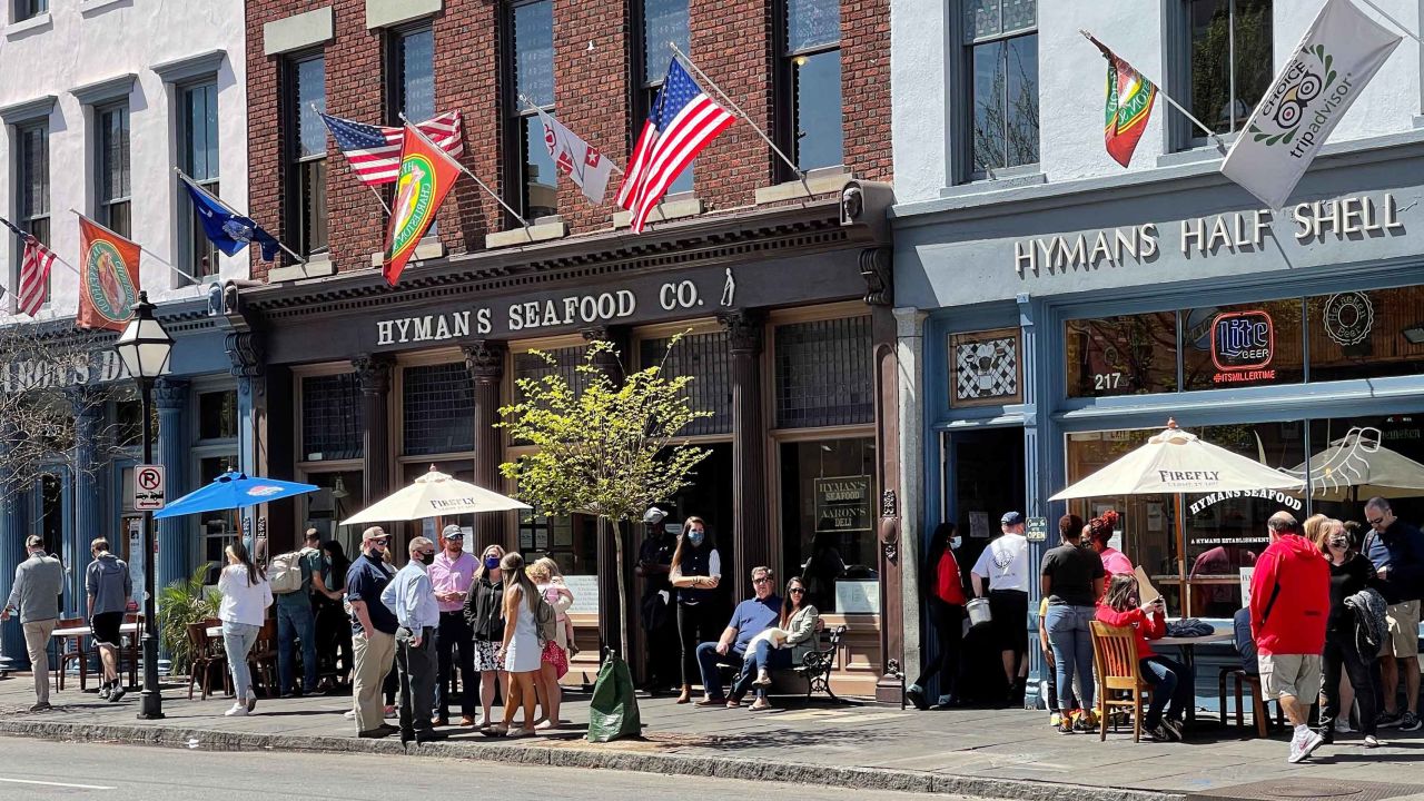 People enjoy the historic center of Charleston, South Carolina on April 4, 2021 amid the Covid-19 pandemic. (Photo by Daniel SLIM / AFP) (Photo by DANIEL SLIM/AFP via Getty Images)