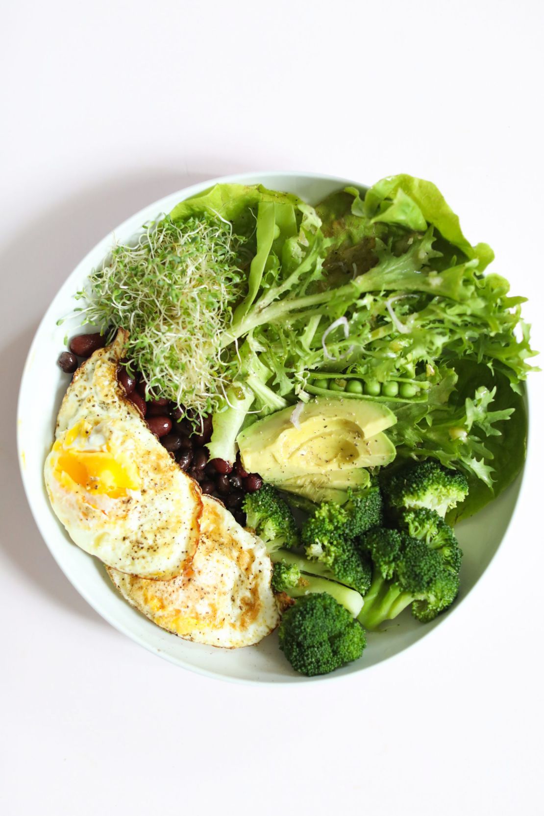 Kooienga's Foundational Five Eggs, Beans and Greens Nourish Meal is a savory option for a balanced breakfast.