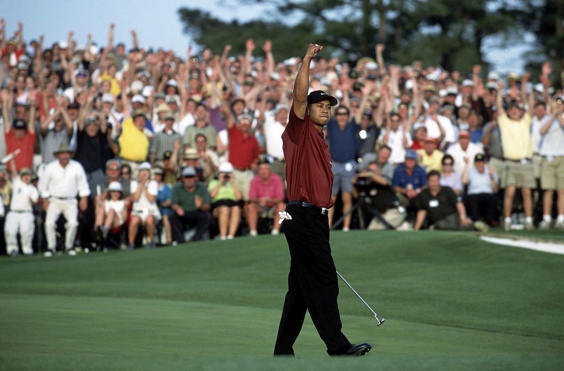 Woods celebrates after winning the 2001 Masters.