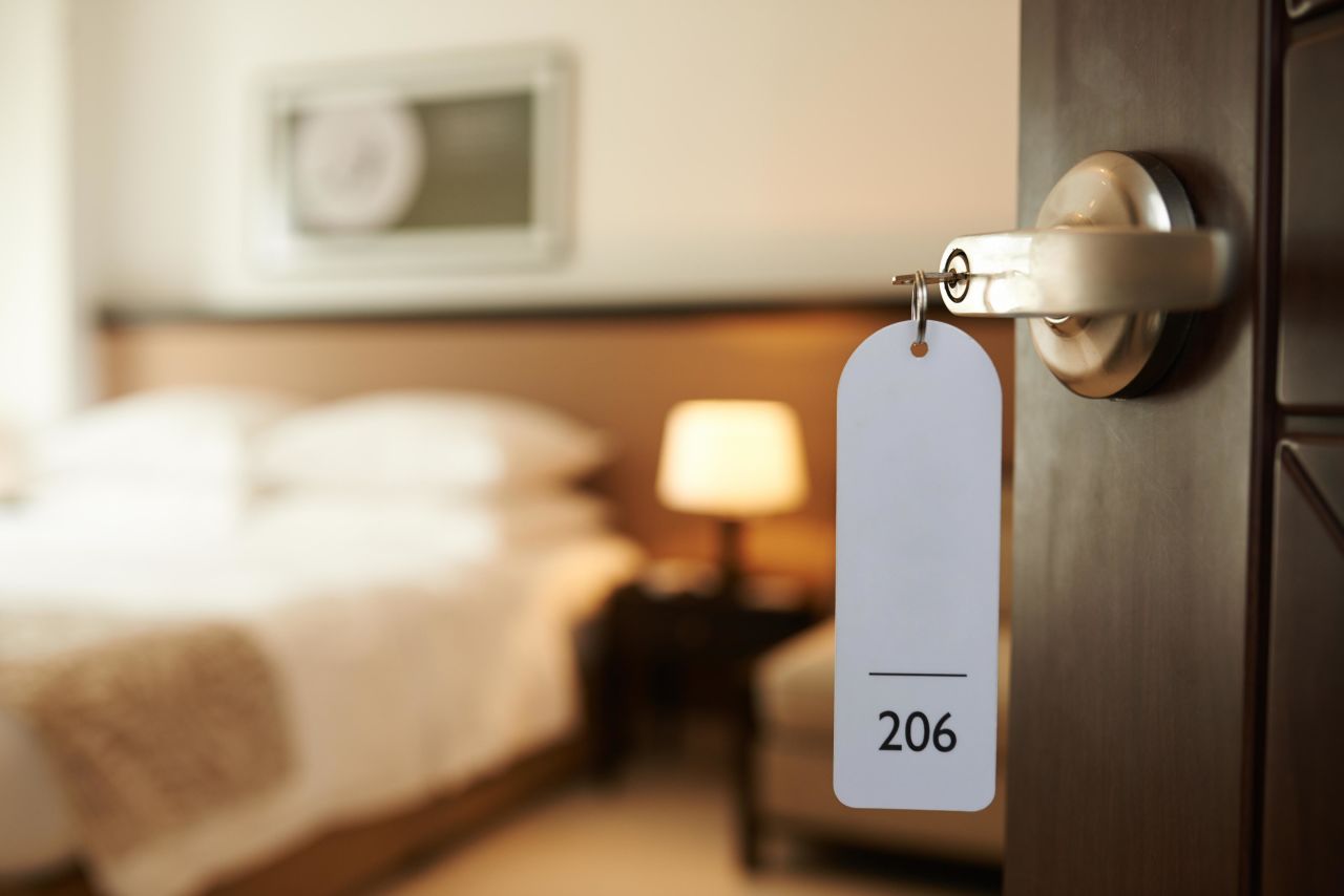 Staying in a hotel can be less risky than other activities since you have your own room, but you still need to be careful in common areas.