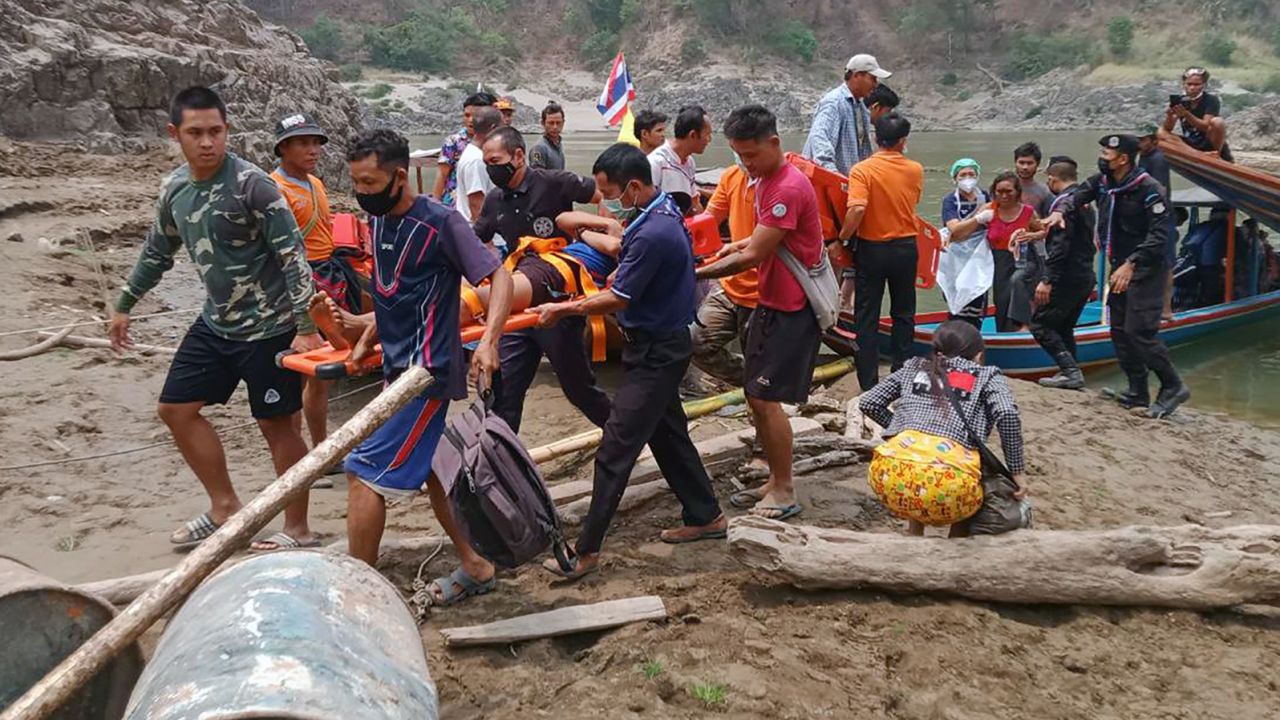 A handout photo made available by Royal Thai Army shows injured fleeing Karen villagers arriving after crossing at a Thai-Myanmar border in Mae Hong Son province, Thailand, 30 March.