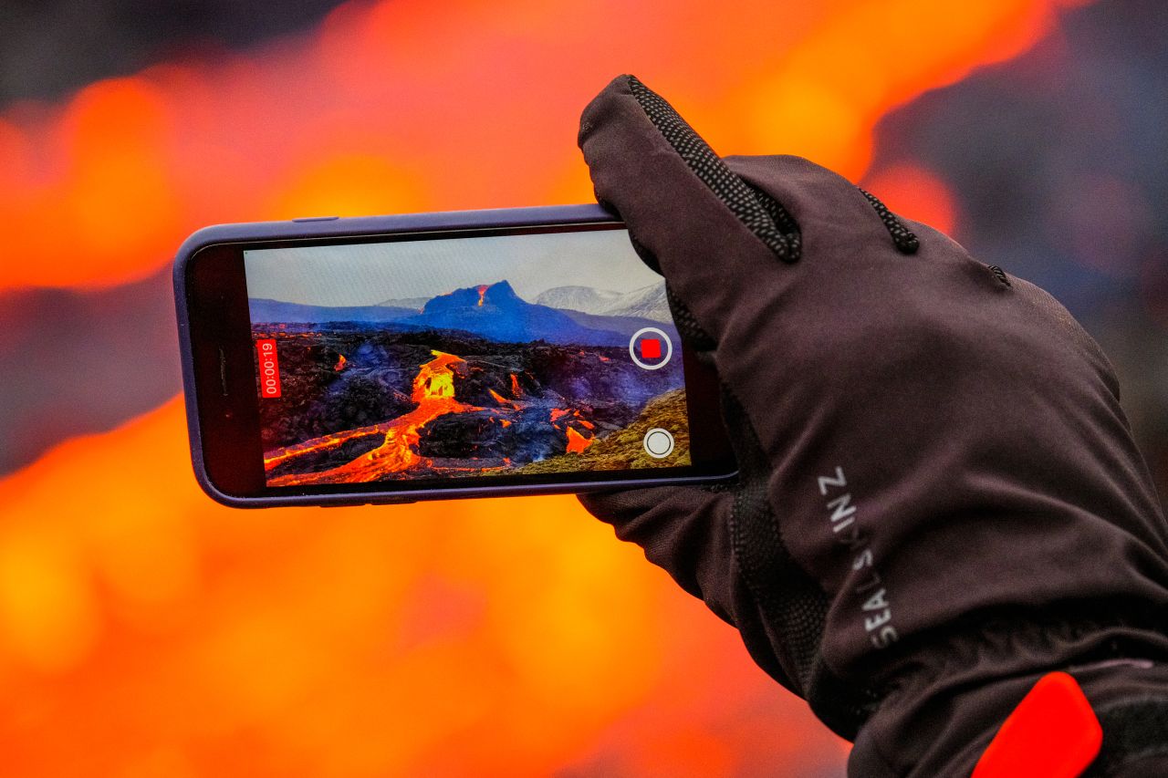 A hiker takes video of the lava flows on March 25.