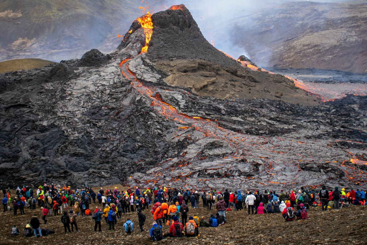 Hikers gather to watch the volcano on March 21.