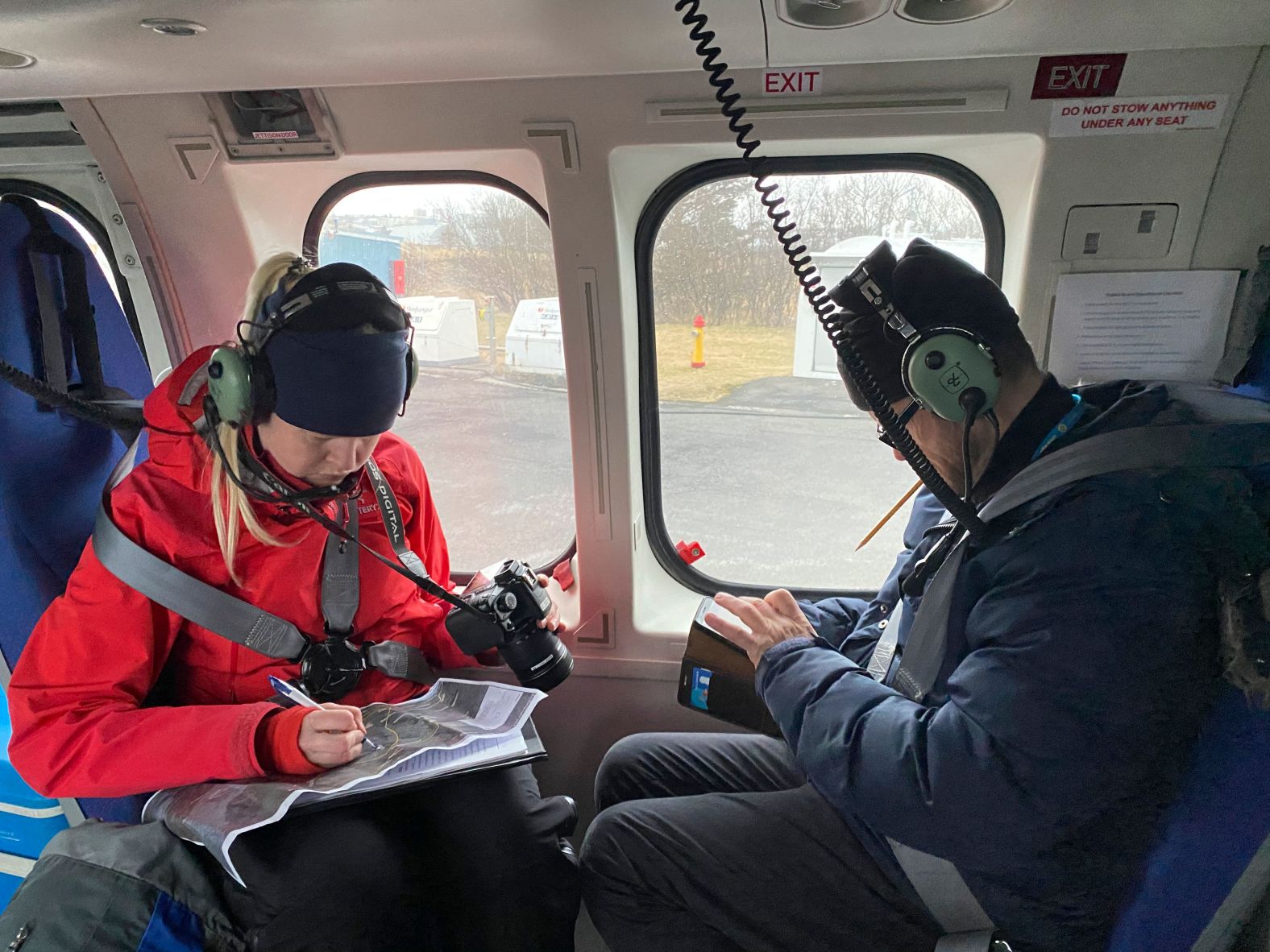 Scientists get ready for a helicopter flight to the volcano on March 20.