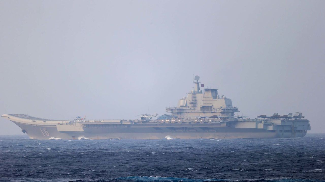 Chinese aircraft carrier Liaoning sails through the Miyako Strait near Okinawa in this photo released by Japan's Defense Ministry on April 4, 2021.