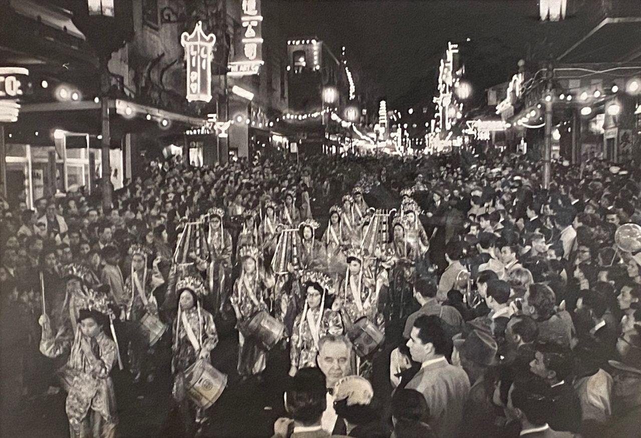 Female drummers marching in a Chinese New Year Parade in 1958, the same year June Gong (pictured up top) won Miss Chinatown. 