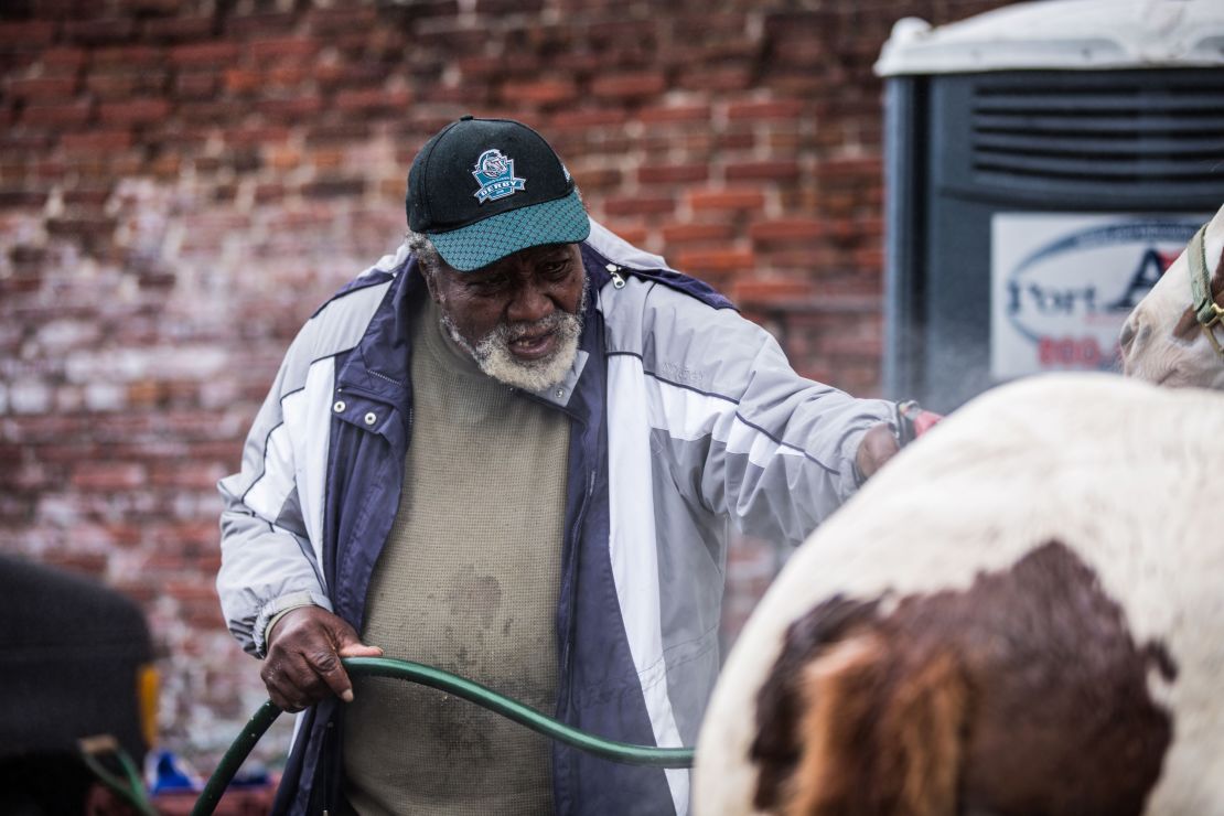 Ellis Ferrell prepares his horses for a voter turnout event last November.
