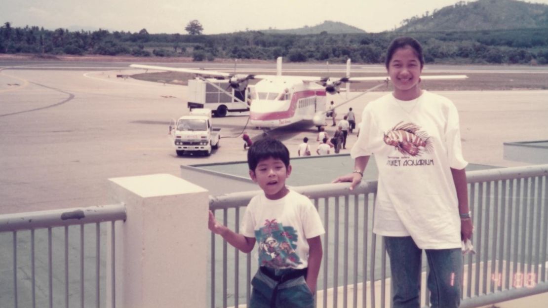 Nik Sennhauser (left) has been obsessed with airplanes since childhood -- seen here at Phuket airport in 1988.
