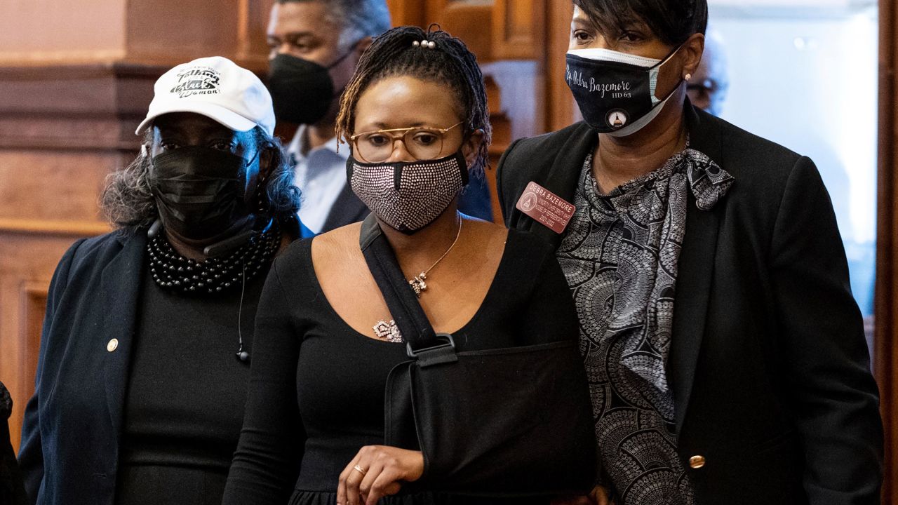 Georgia State Rep. Park Cannon, D-Atlanta, walks into the House Chamber of the State Capitol in Atlanta on Monday morning, March 29, 2021 after being arrested last week for knocking on the governor's office door as he signed voting legislation. 