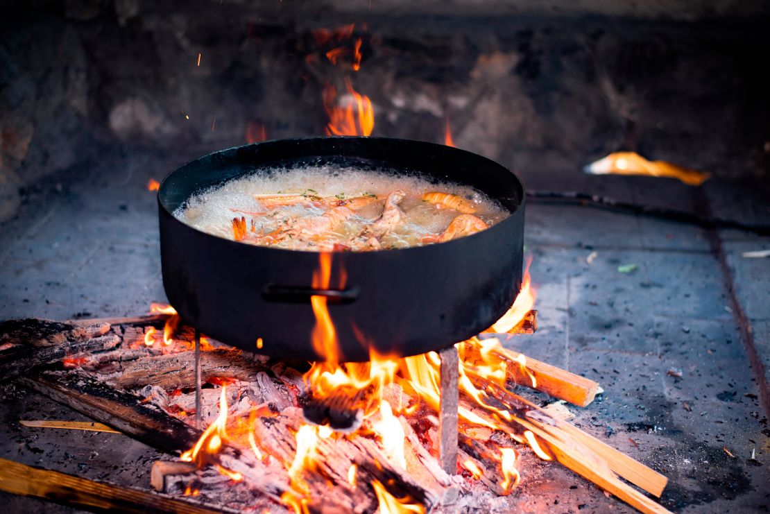 Dagmar in Croatia cooked a shrimp stew over an open fire.