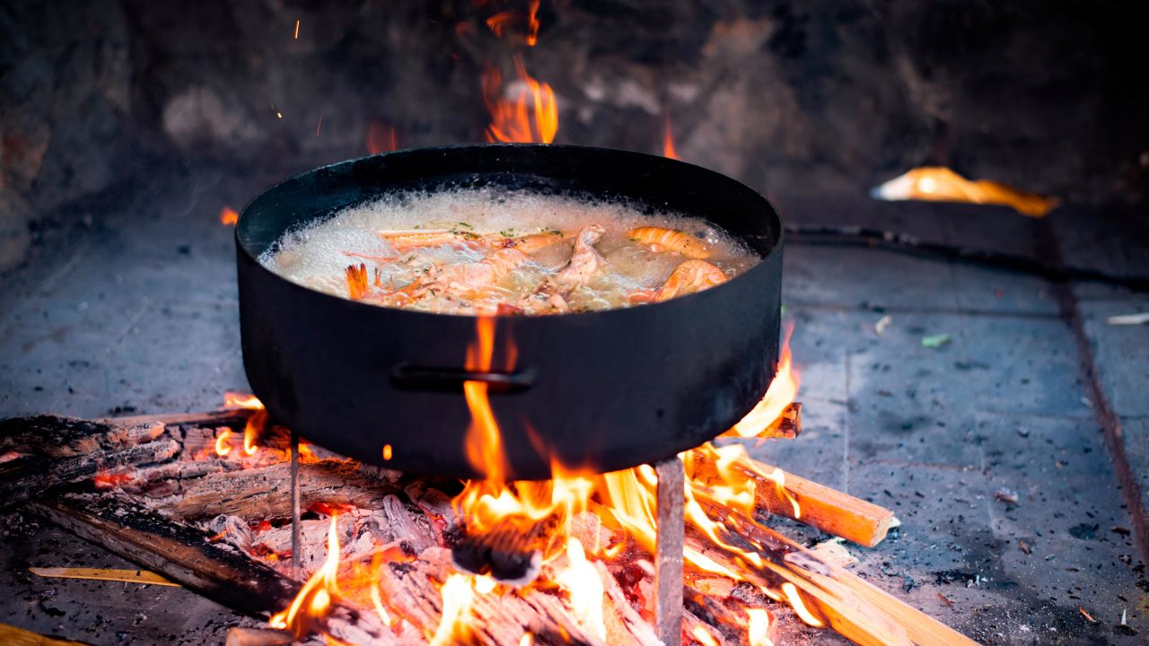 Dagmar in Croatia cooked a shrimp stew over an open fire.