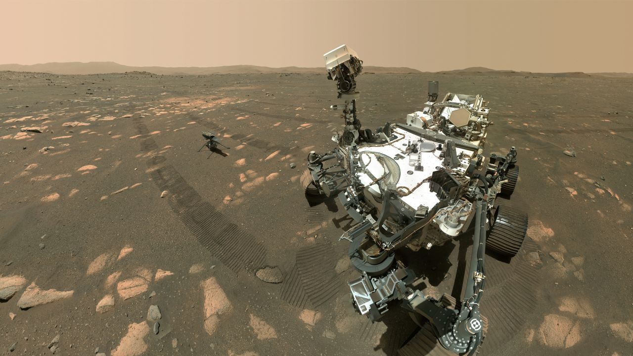 NASA's Perseverance Mars rover (right) took a selfie with the Ingenuity helicopter (left) on April 6.