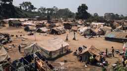 This photograph taken on January 21, 2021, shows dozens of makeshift shelters set-up by Central African refugees who fled Bangassou to Ndu, Bas-Uele Province, Democratic Republic of Congo. - In mid-January, the United Nations High Commissioner for Refugees (UNHCR) deployed in the northern DRC to assess and respond to the Central African refugee crisis. Since early January, more than 90,000 Central Africans have fled to neighboring Congo from fighting between the coalition of armed groups (CPC) seeking to overthrow newly re-elected President Faustin-Archange Touadera and national security forces backed by thousands of peacekeepers and Rwandan and Russian fighters. (Photo by ALEXIS HUGUET / AFP) (Photo by ALEXIS HUGUET/AFP via Getty Images)