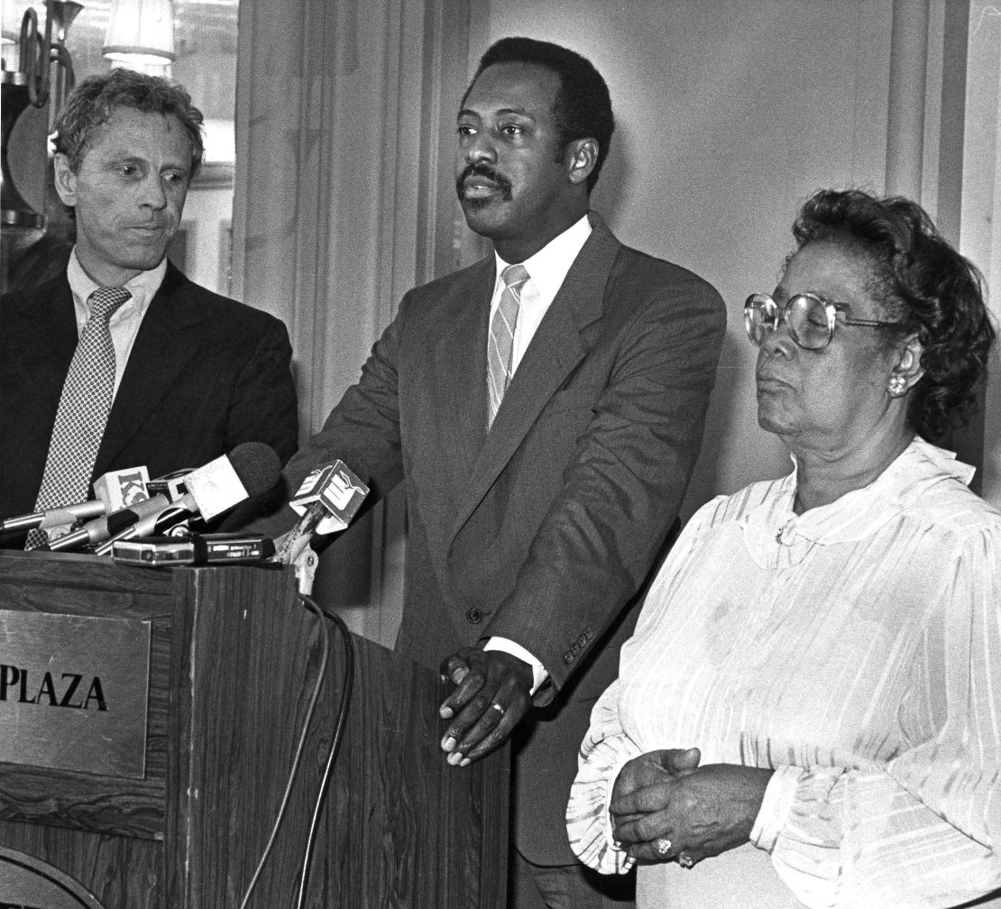Mrs. Donald is shown at a news conference with her attorneys, State Sen. Michael Figures, center at podium, and Morris Dees, founder of the Southern Poverty Law Center. 