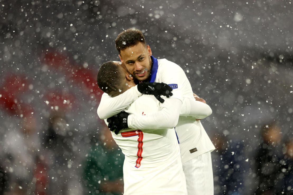Mbappe (left) and Neymar celebrate during PSG's victory over Bayern Munich. 