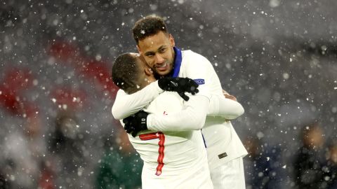 Mbappe (left) and Neymar celebrate during PSG's victory over Bayern Munich.