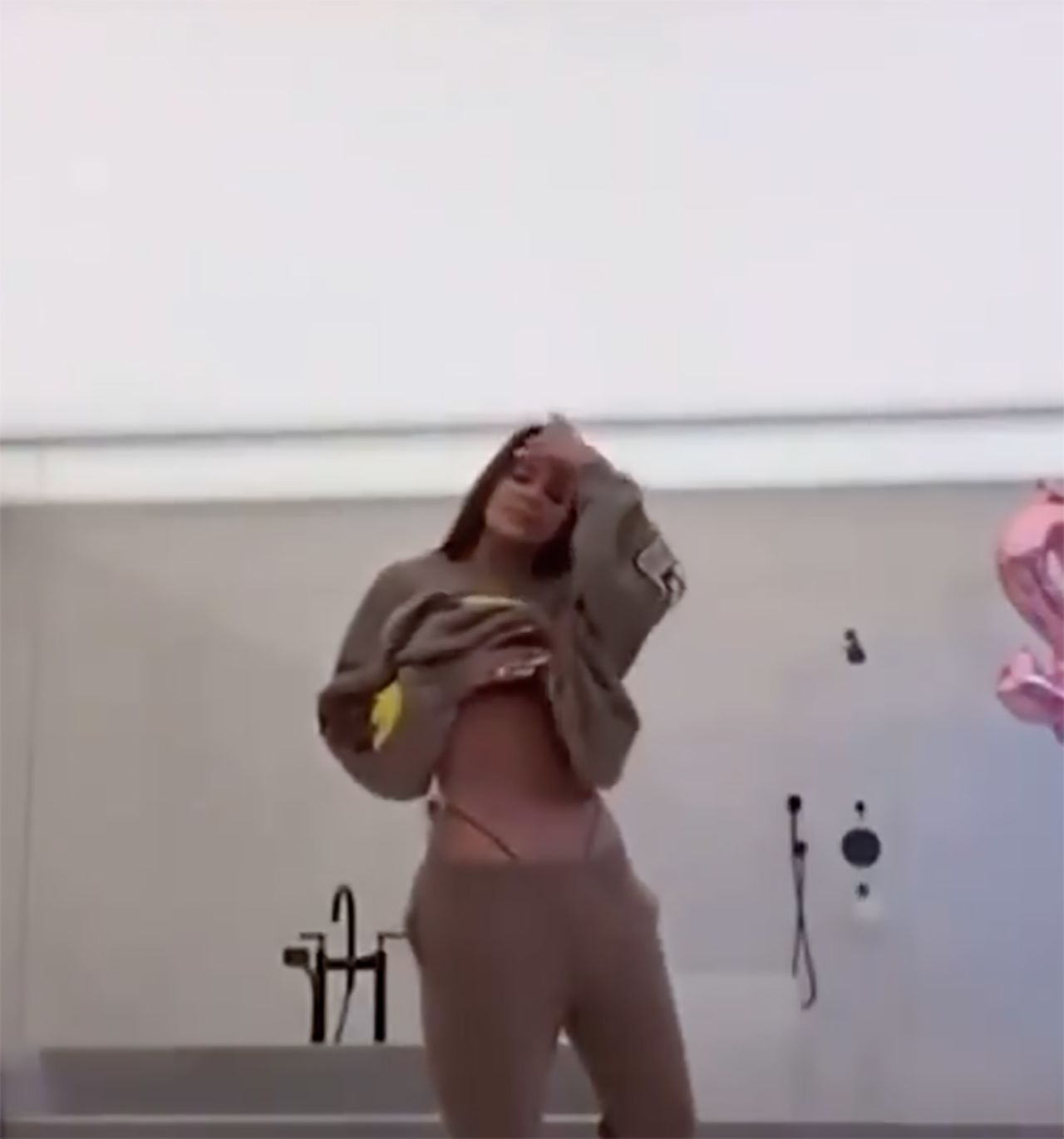 After trying to remove a photo of herself that was mistakenly posted to social media, Kardashian responded to internet comments with a video showing her unedited body.
