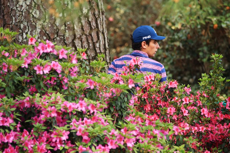 Joaquin Niemann looks for his ball on the 10th hole Thursday.