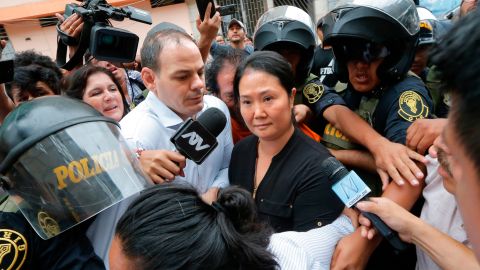 Keiko Fujimori (R) came in joint first in a recent poll but is under investigation for corruption.