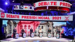 Peruvian presidential candidates (L-R) Hernando de Soto for the Go-On Country Party, Andres Alcantara for the Direct Democracy Party, Ollanta Humala for the Nationalist Party, Jose Castillo for the Free Peru Party, Daniel Urresti for the We Can Peru Party, and Jose Vega for the Unity for Peru Party, take part in the second televised debate round organized by the National Electoral Jury, in Lima on March 30, 2021. - Six out of 18 presidential candidates participated in the second debate two weeks before elections in Peru. (Photo by SEBASTIAN CASTANEDA / POOL / AFP) (Photo by SEBASTIAN CASTANEDA/POOL/AFP via Getty Images)