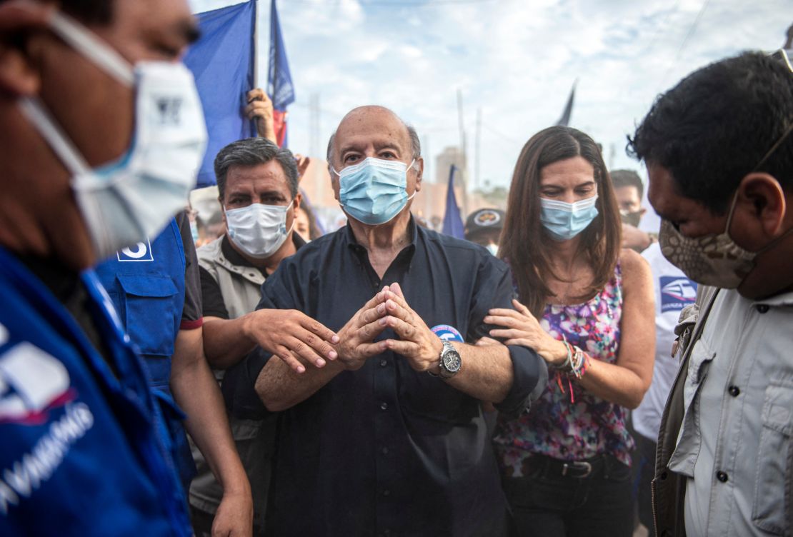 Hernando De Soto (C) is a well-known economist known for his work on the informal economy.