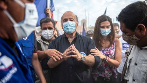 Hernando De Soto (C) is a well-known economist known for his work on the informal economy.