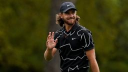 Tommy Fleetwood, of England, waves to the gallery as he walks up the first fairway during the first round of the Masters golf tournament on Thursday, April 8, 2021, in Augusta, Ga. (AP Photo/Matt Slocum)
