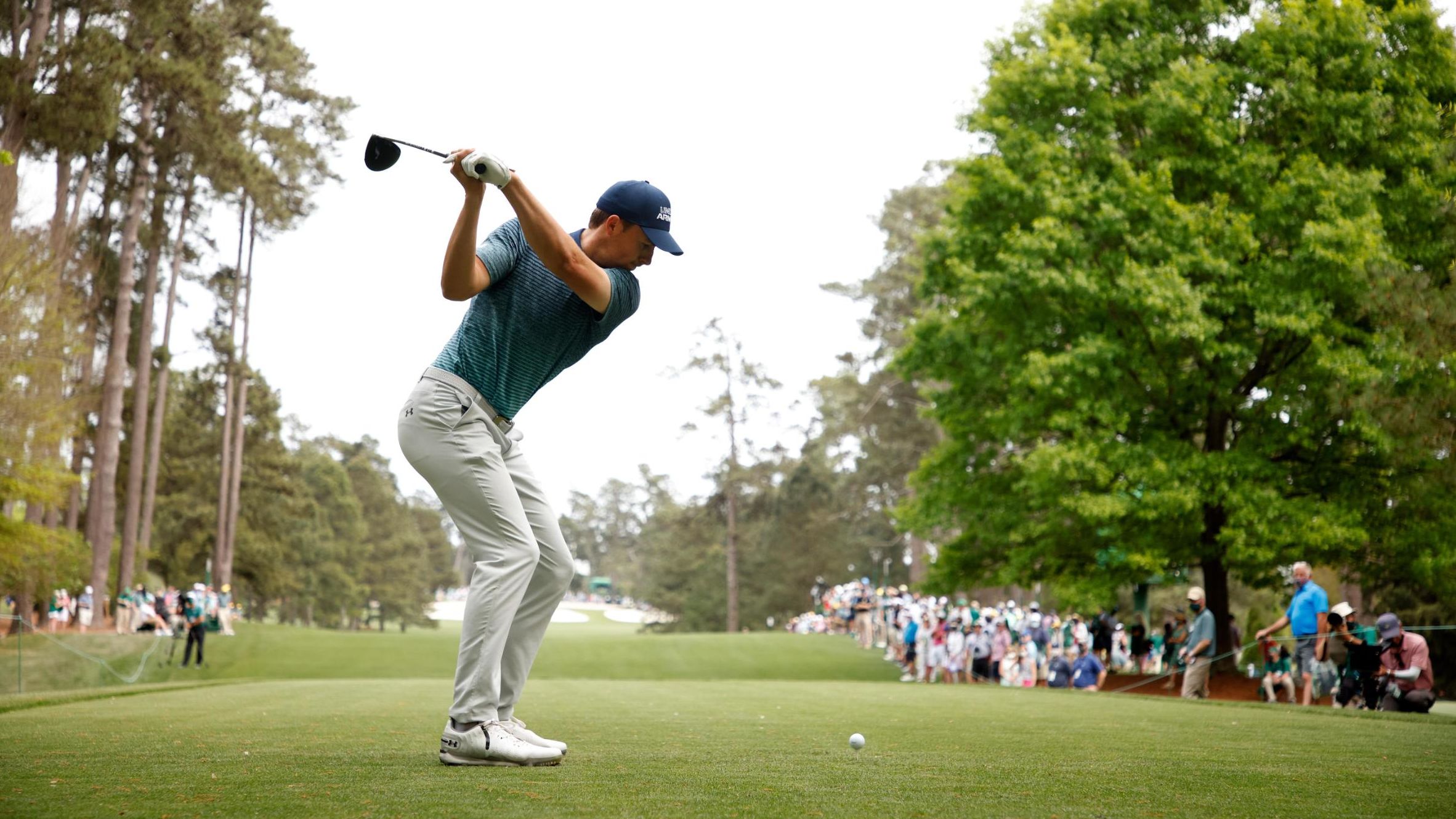Spieth hits a tee shot on Thursday.