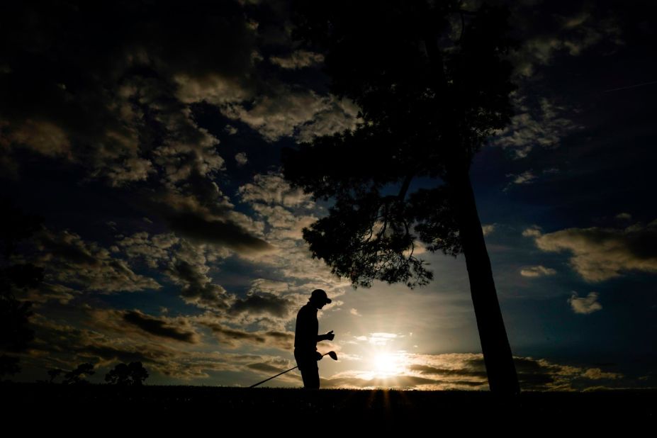 Max Homa walks down the 18th fairway on Thursday.