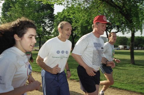 Breyer and his daughter Chloe jog with Clinton in May 1994.