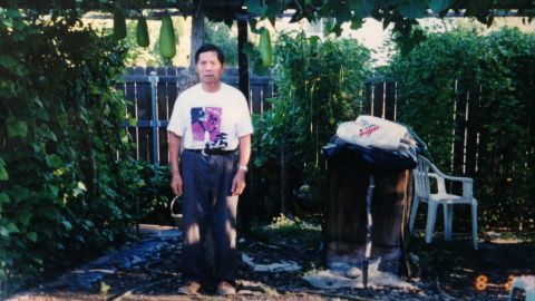 Green thumb: Selina Wang's grandfather in the family's yard, which they converted into a vegetable garden.